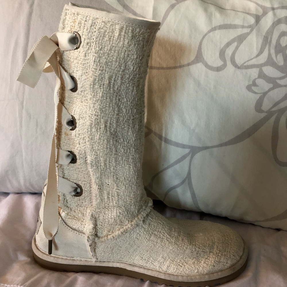 Girls cream colored UGG lace up boots